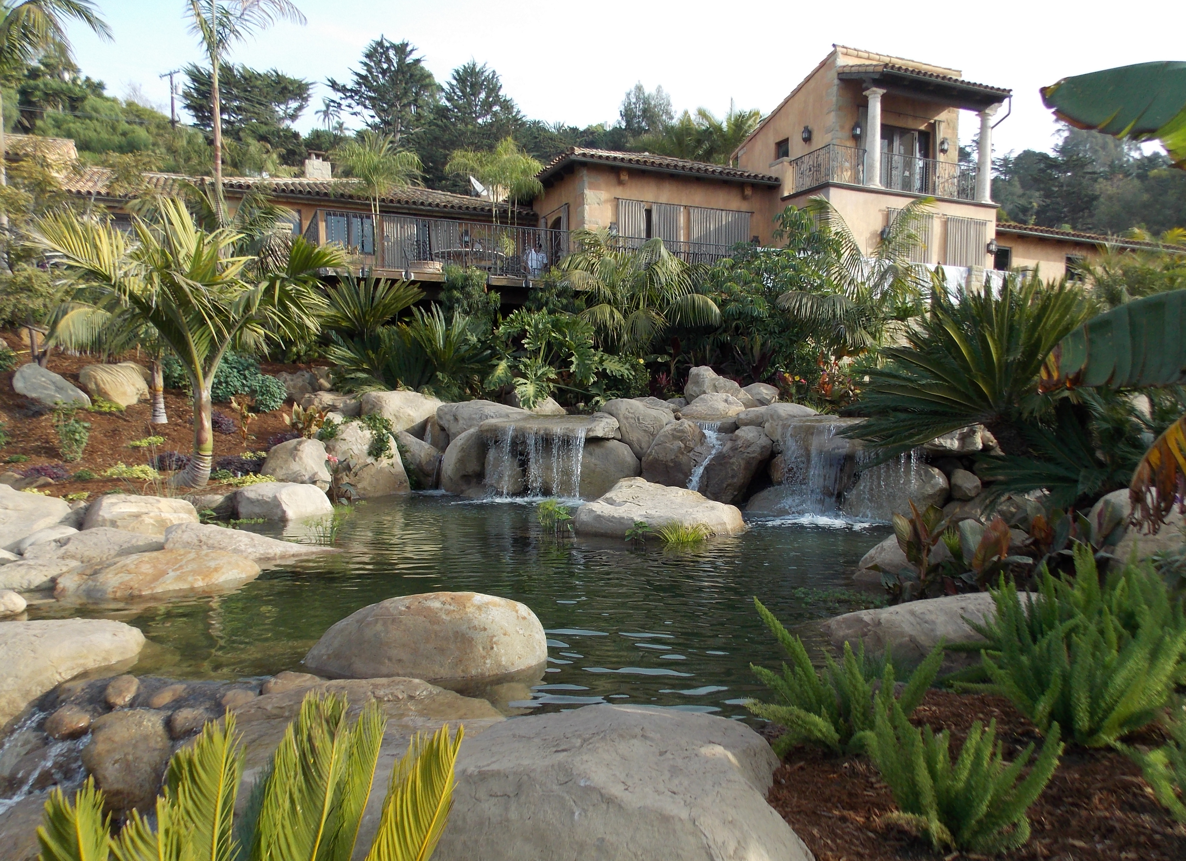 Tropical Garden with Waterfall