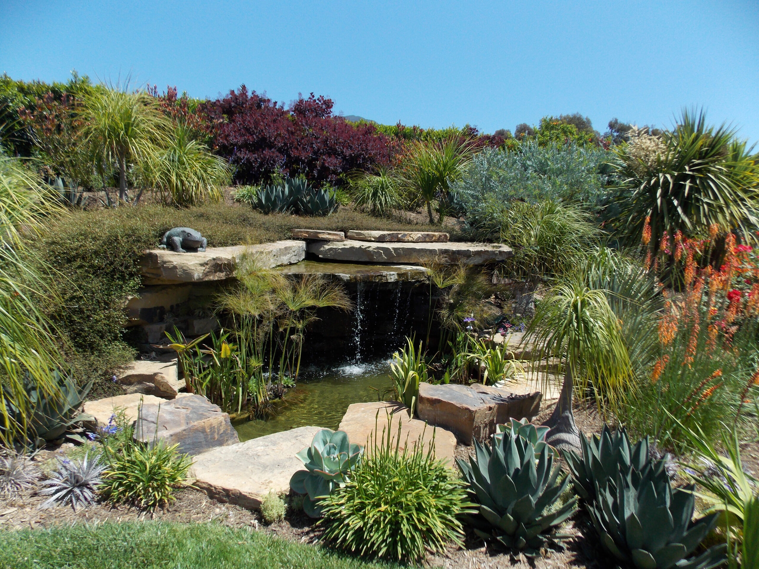 Garcia Rock And Water Design buids A Layered rock waterfalls