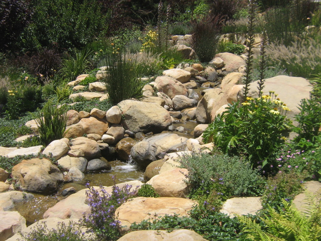 Santa Barbara sandstone rock, boulder and cobble incorporated into this man made water feature.