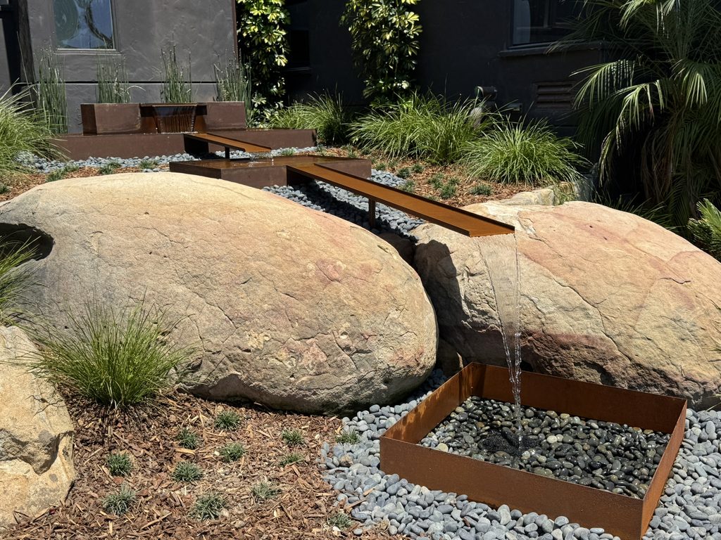 Garcia Rock And Water Design accepts the challenge when a Designer asked us to install this Corten Steel fountain
