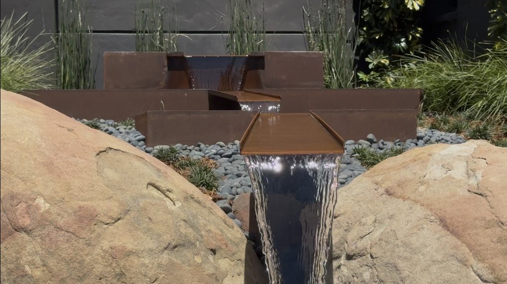 Garcia Rock And Water Design installs custom Corten Steel fountain
